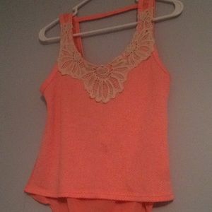 A bright pink tank top